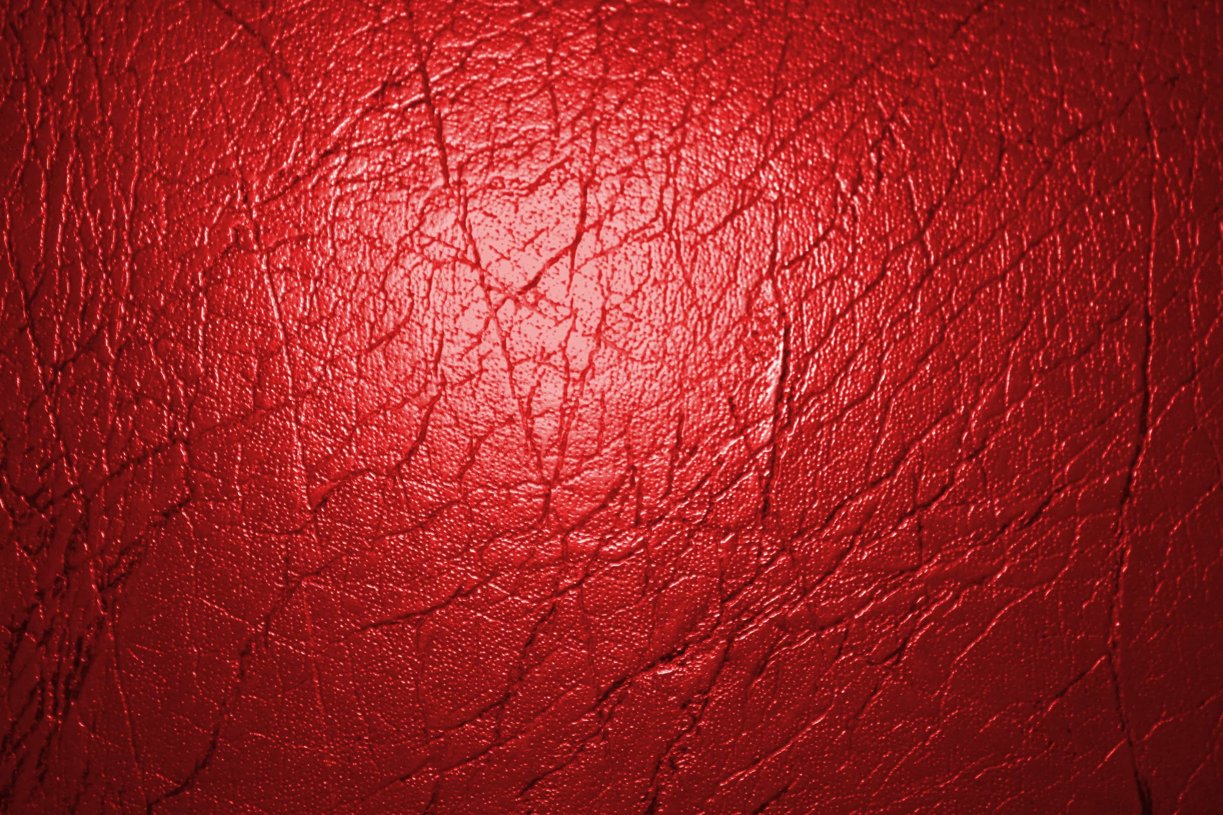 A close up picture of a red leather